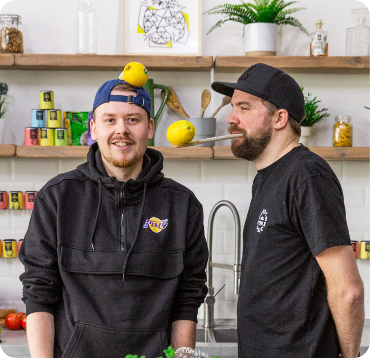 The Just Spices kitchen with 2 employees